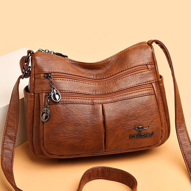 Bolso bandolera texturizado multibolsillos