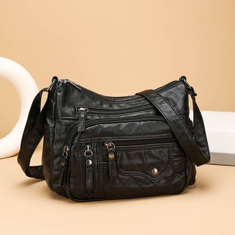 Bolso de mujer sencillo de piel suave y gran capacidad.