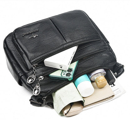 Bolso bandolera texturizado multibolsillos