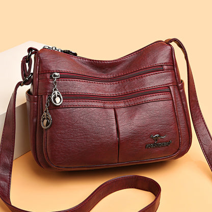 Bolso bandolera texturizado multibolsillos