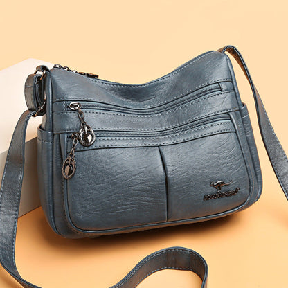Bolso bandolera texturizado multibolsillos