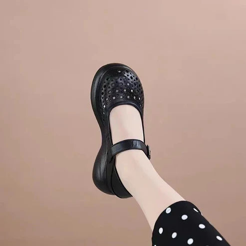 Crocs de punta redonda de cuero genuino