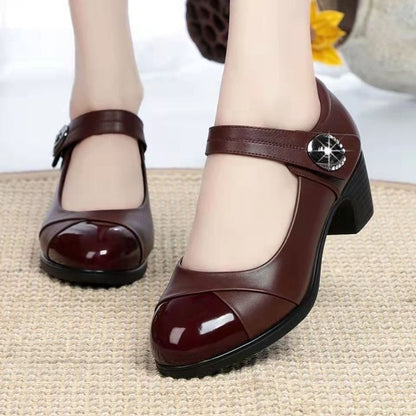 Tacones altos con hebilla de piel suave