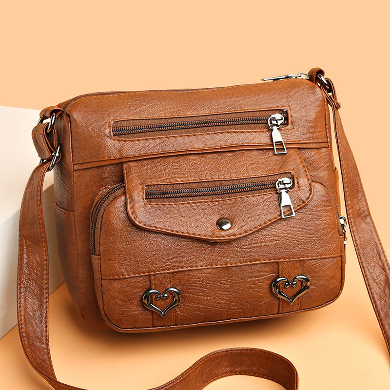Bolso bandolera 100% piel auténtica.