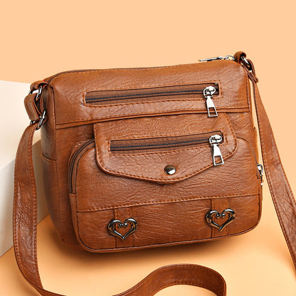 Bolso bandolera 100% piel auténtica.